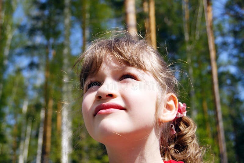 The girl looking upwards