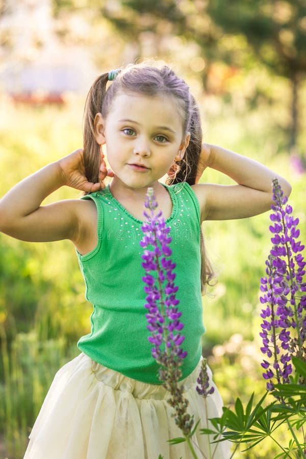 Girl and Lupine Flower in Nature Stock Image - Image of plant ...