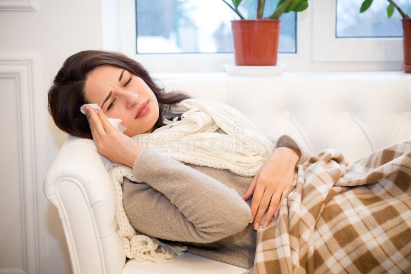 Girl Lying on the Couch with a Headache Stock Image Image of unwell
