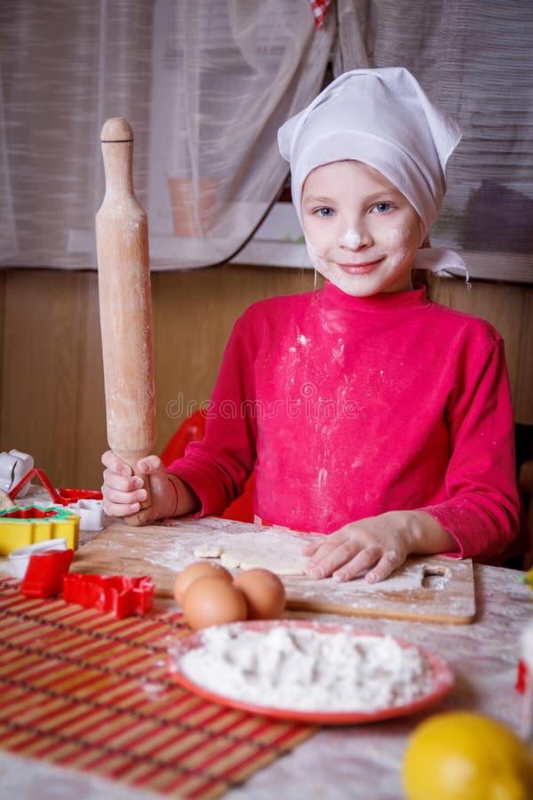 Girl Making Dough with Rolling Pin Stock Image Image of cutter, girl