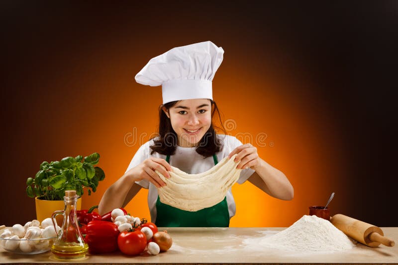 Girl making pizza dough stock image. Image of fancy, baking 19510811