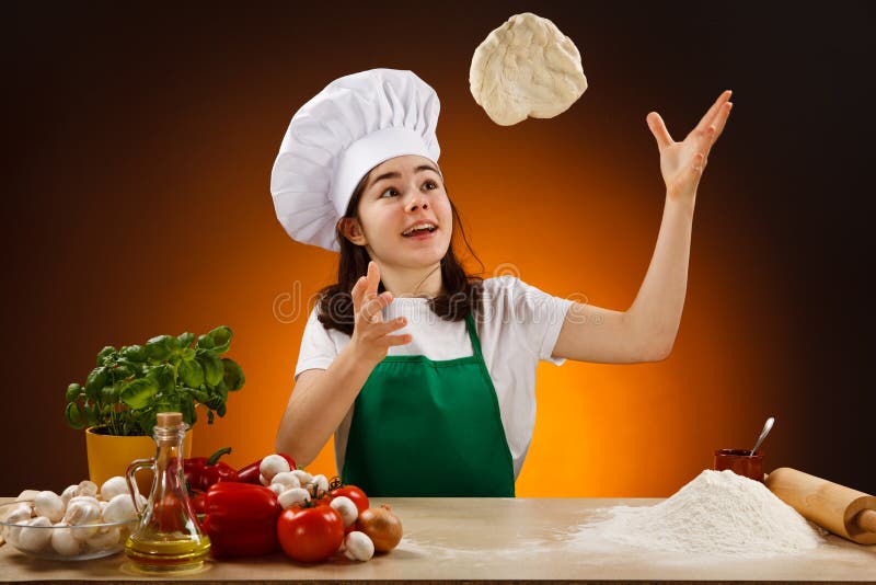 Girl making pizza dough stock photo. Image of mixing 19510824