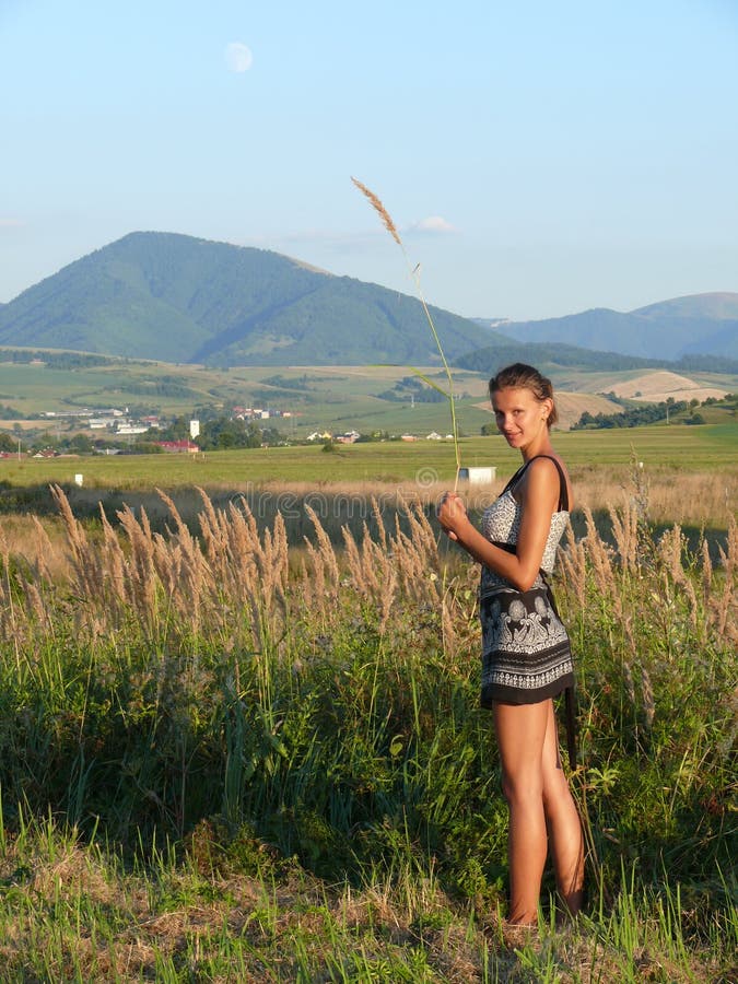 Girl in meadows in Slovakian landscape