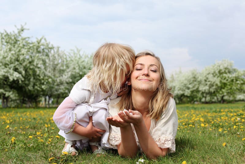 Girl with mother in the park