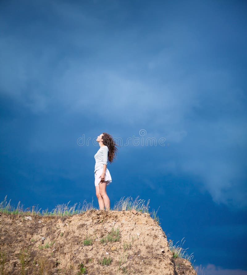 Girl on a mountain stock image. Image of landscape, peak 42703527