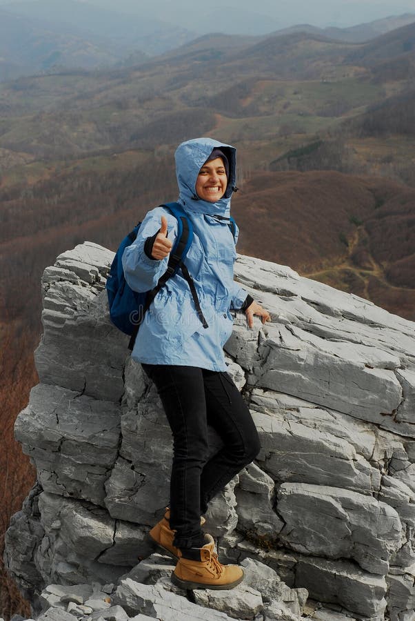 Girl on mountain top