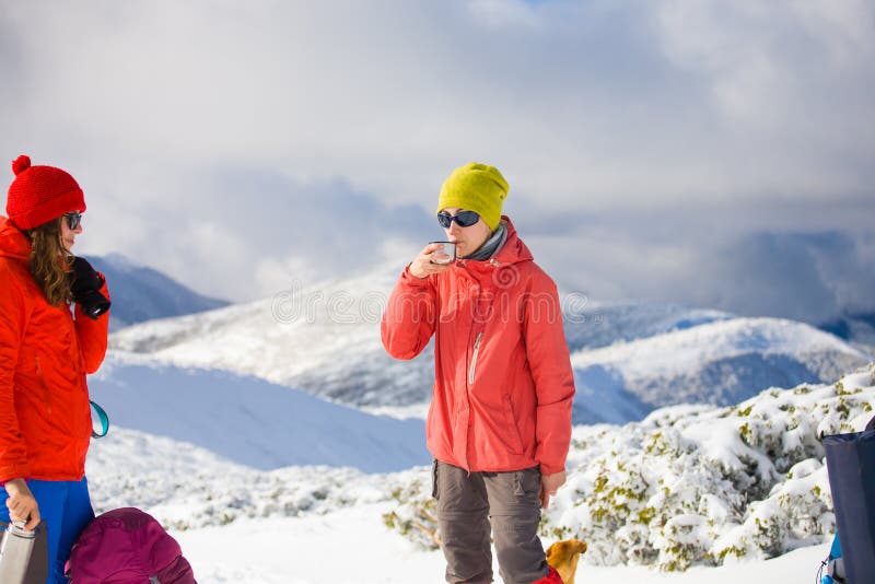 The girl in the mountains with coffee. royalty free stock image The girl in the mountains with coffee. royalty free stock image