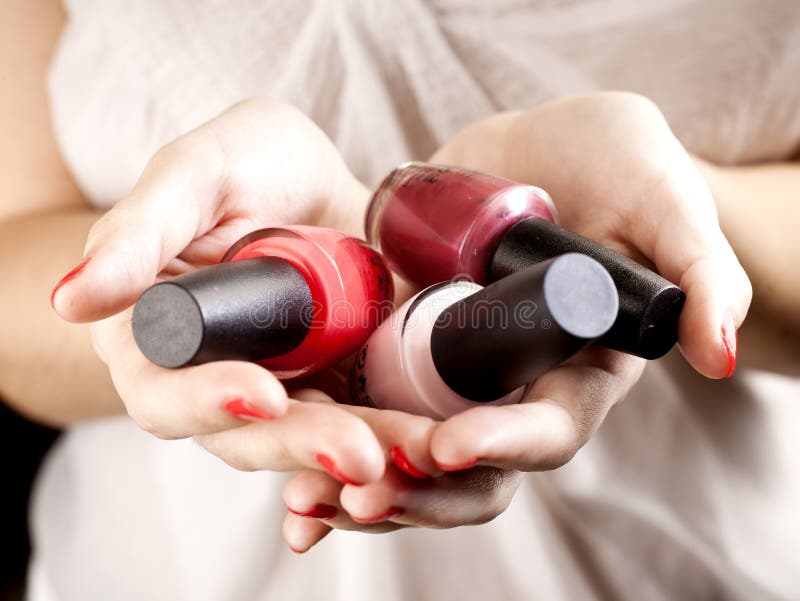 Girl with nail polish stock photography