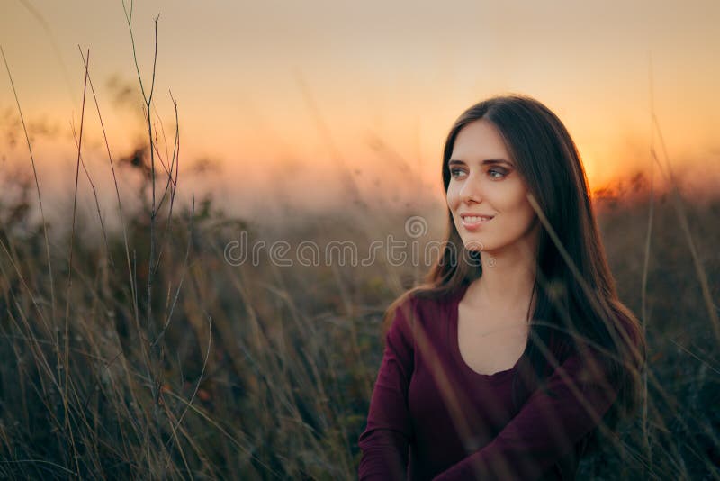 Fashion Portrait of a Happy Woman Admiring Sunset royalty free stock photo Fashion Portrait of a Happy Woman Admiring Sunset royalty free stock photo