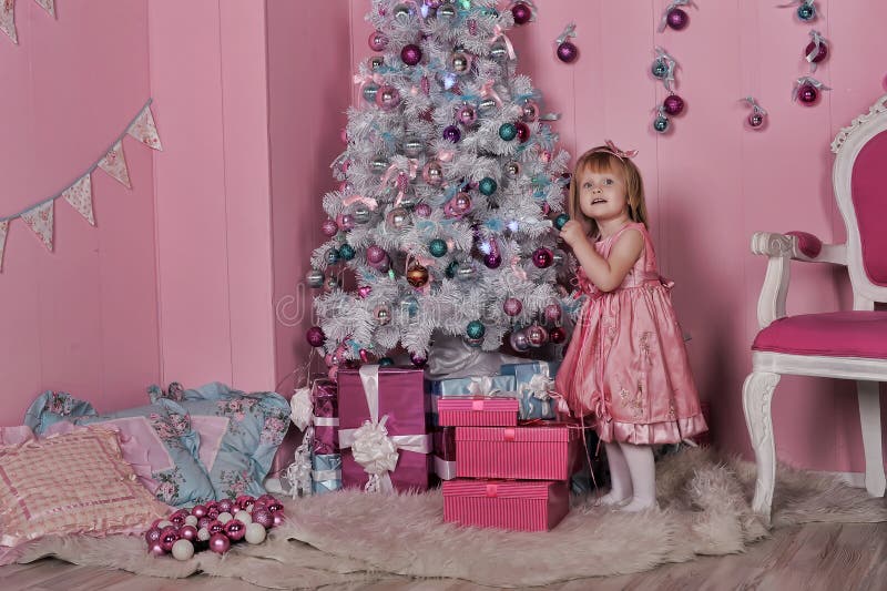 Christmas Tree and Angelic Little Girl Stock Photo - Image of tree ...
