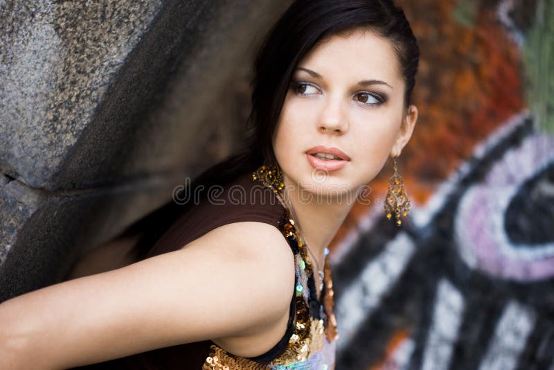 Girl near the wall