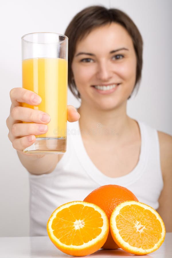 Girl offering orange juice