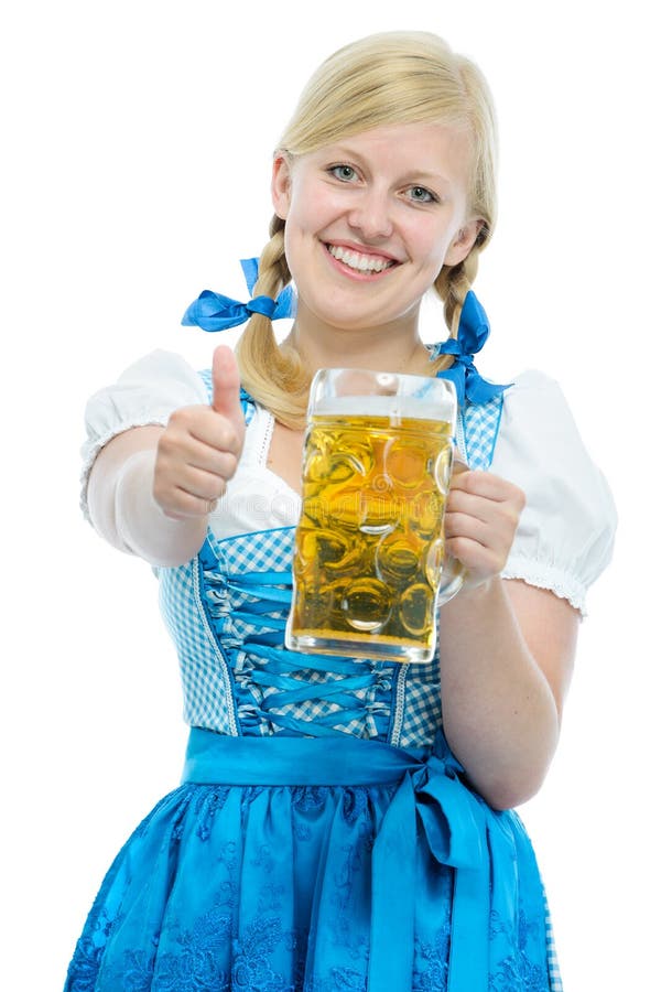 Girl in Oktoberfest dirndl holds Oktoberfest beer stein stock photography Girl in Oktoberfest dirndl holds Oktoberfest beer stein stock photography