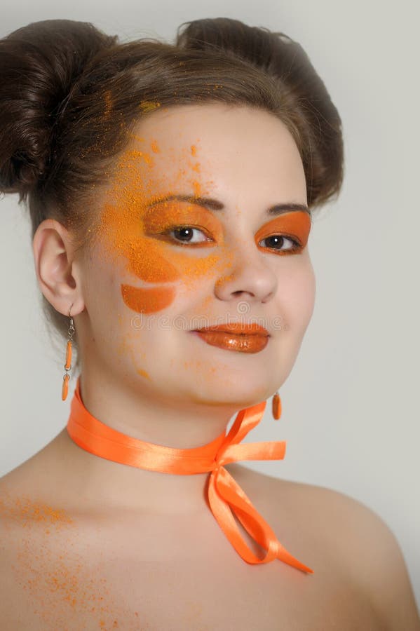 Girl with orange makeup stock photo. Image of colored 24795562