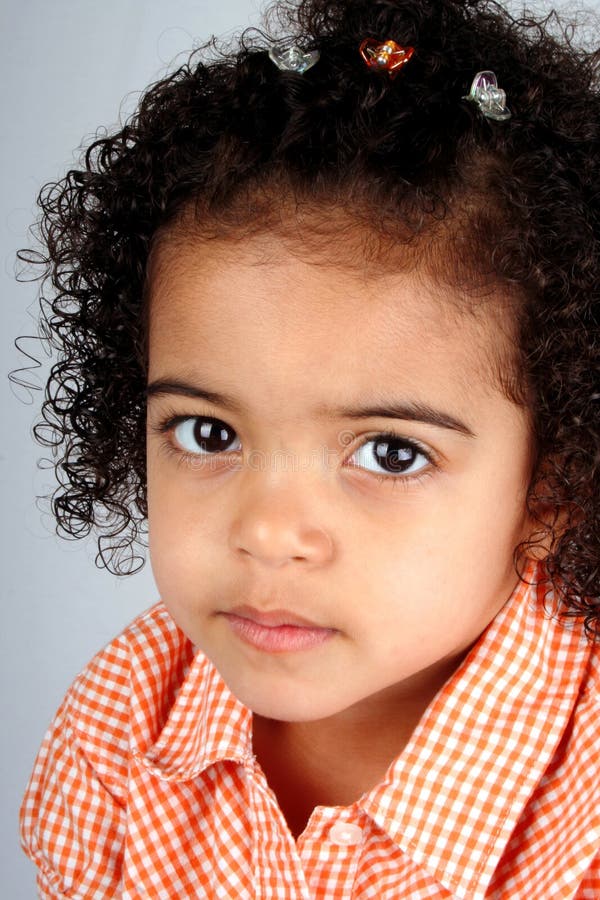 Girl In Orange Shirt Picture. Image 2436089