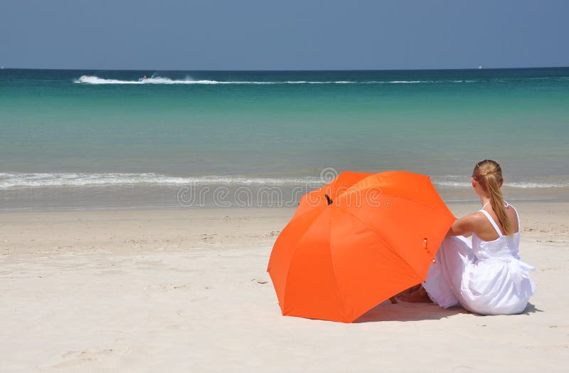 Girl with an orange umbrella