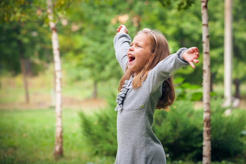 Girl outdoors in sunny summer day