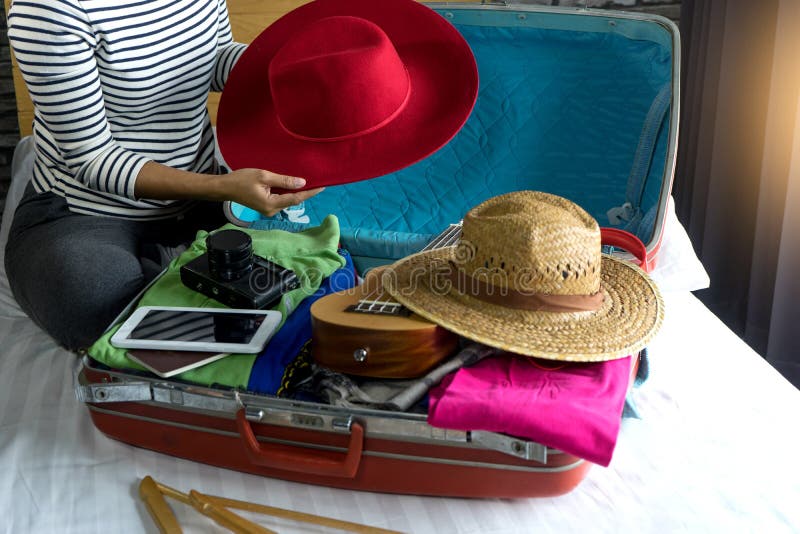 Girl packing luggage preparing for her trip 1308489 Stock Photo at