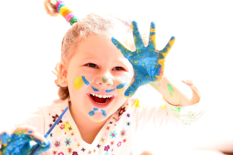 Girl with paint hands isolated on white