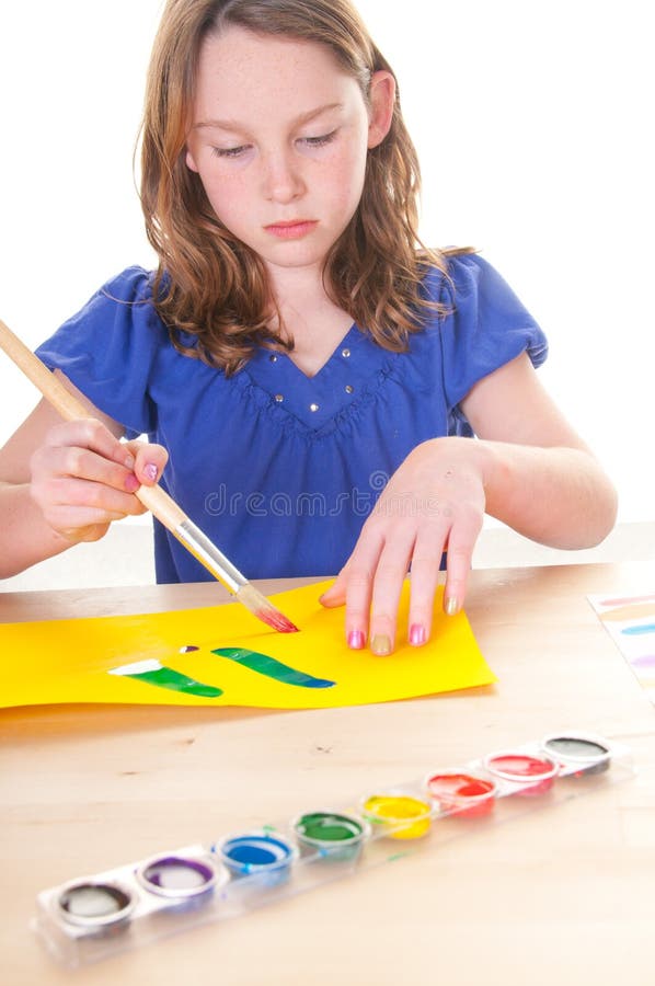 Girl painting picture stock photo. Image of school, paintbrush 18162832