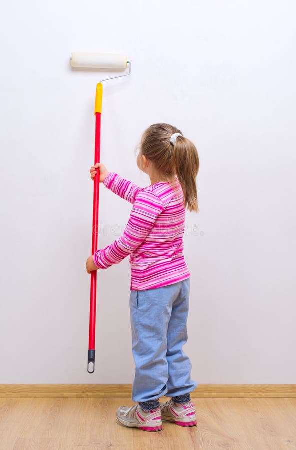 Girl with painting roller stock photo. Image of beautiful 26732216