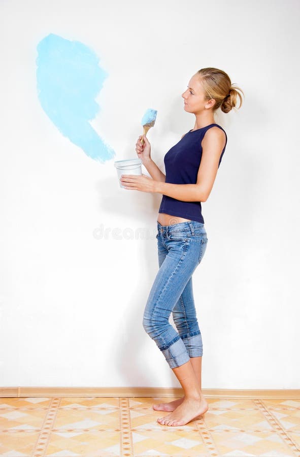 Girl painting the walls stock image. Image of beautiful 21294759