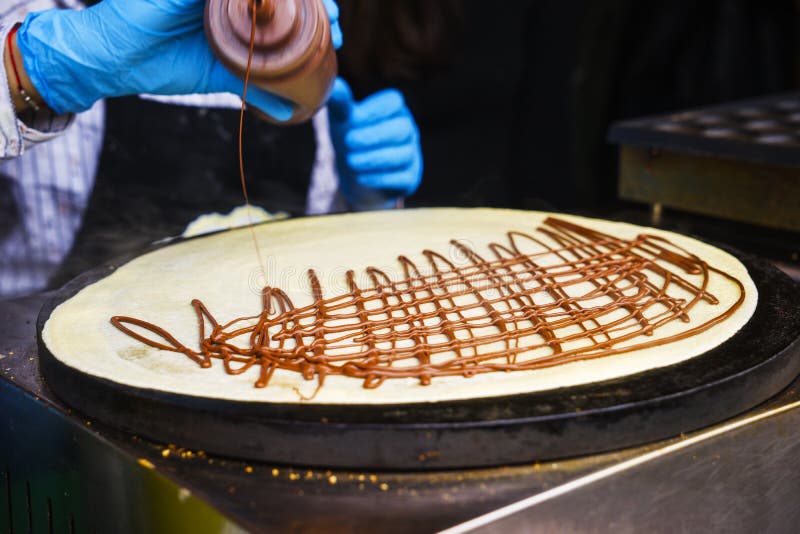 Girl is a Pastry Chef Making Pancakes. Steps of Making Cooking Pancake