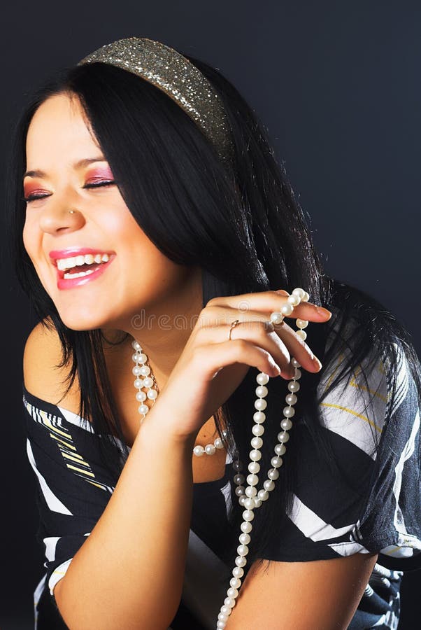 Girl with a pearl necklace stock image. Image of fingers 5132409