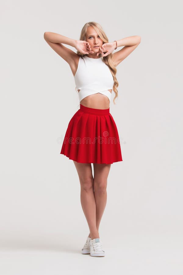 Girl With Perfect Body In Red Skirt On A White Background Stock Image Image Of High Curly 