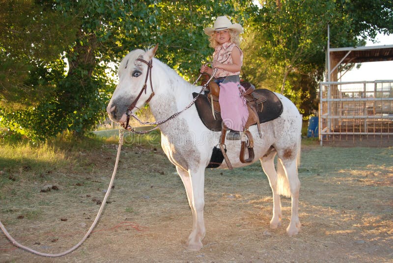 Girl with pet pony.