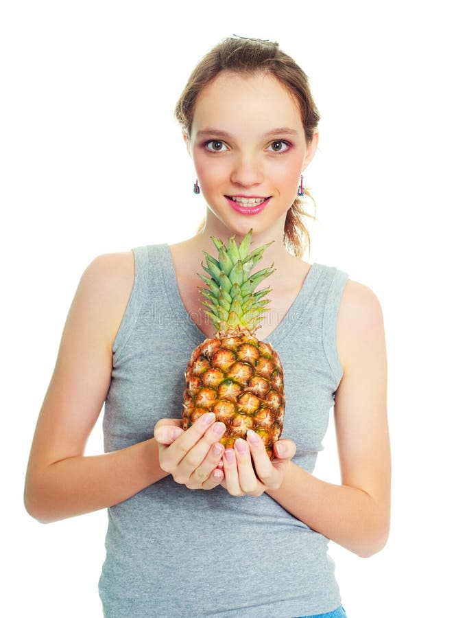 Girl with a pineapple stock image. Image of hand, good 11788761