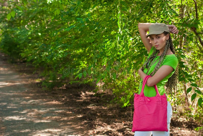 Girl with pink bag stock image. Image of brown, fashionable 10978125