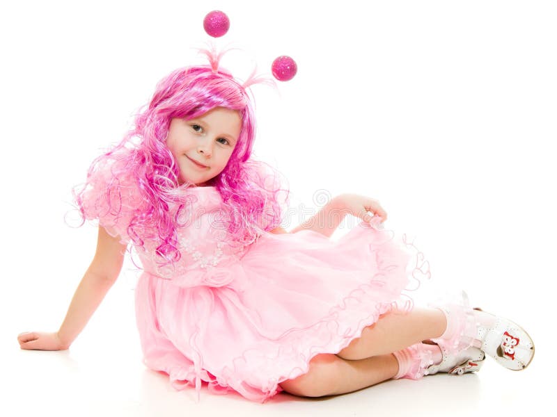 A girl with pink hair in a pink dress