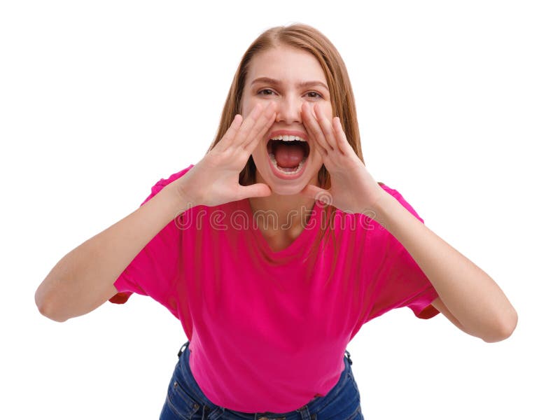 The girl in the pink T-shirt loudly screams, wide-open mouth and holds her hands near her mouth. Isolated on white background. The girl in the pink T-shirt loudly screams, wide-open mouth and holds her hands near her mouth. Isolated on white background.