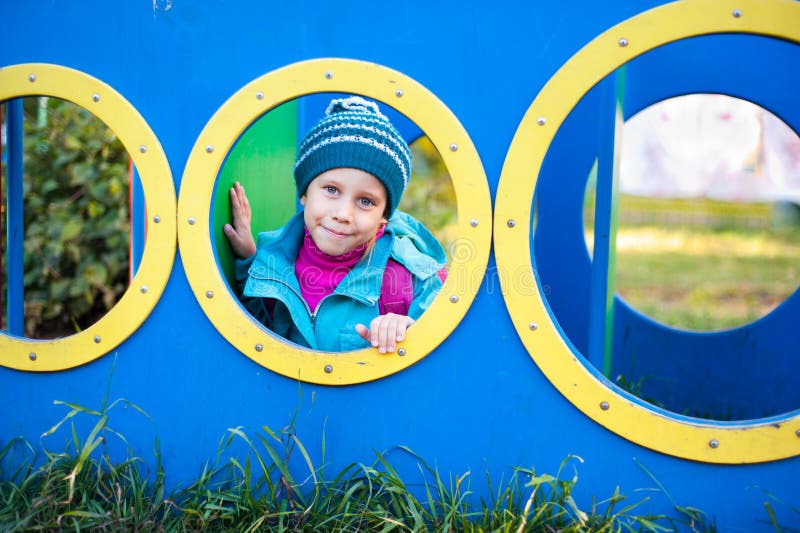 The girl on the playground royalty free stock photo
