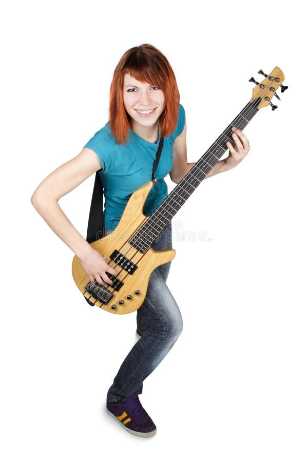 Girl playing bass guitar and smiling