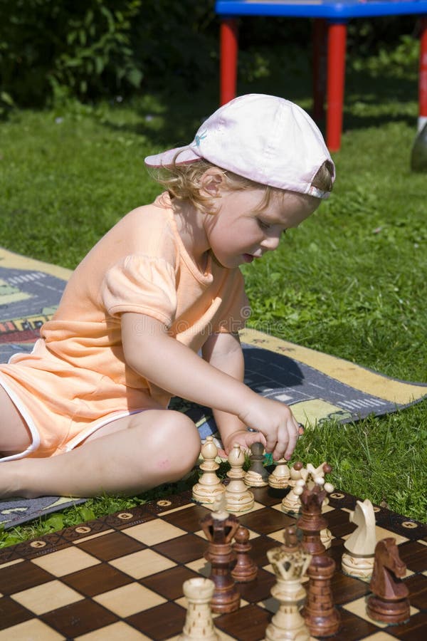 Girl playing chess