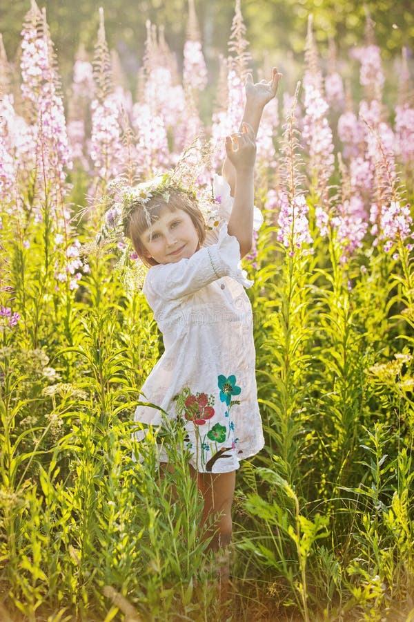 Girl Playing in a Field of Flowers Stock Image - Image of beauty ...