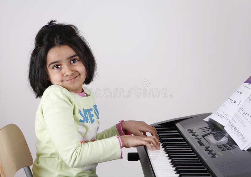 Girl playing keyboard