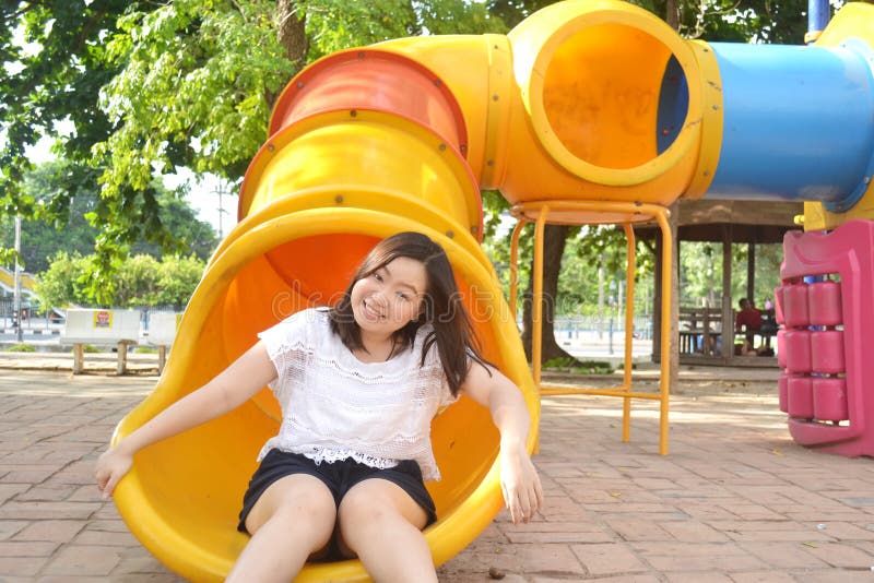 Girl playing at playground stock photo. Image of childish 55331292