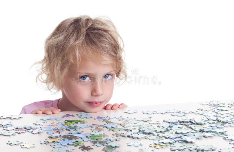 Girl playing puzzles stock photo. Image of puzzles, part 44451338