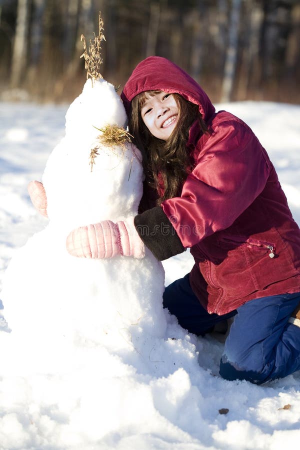 Girl playing in the snow