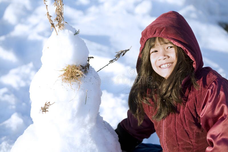 Girl playing in the snow