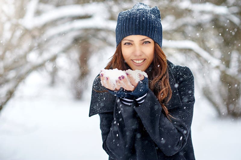 Girl Playing with Snow in Park Stock Image - Image of closeup, model ...