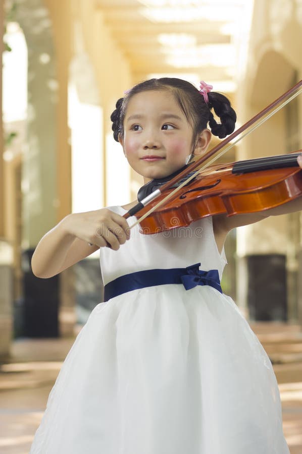 Girl playing violin stock photo. Image of instrument 25543134