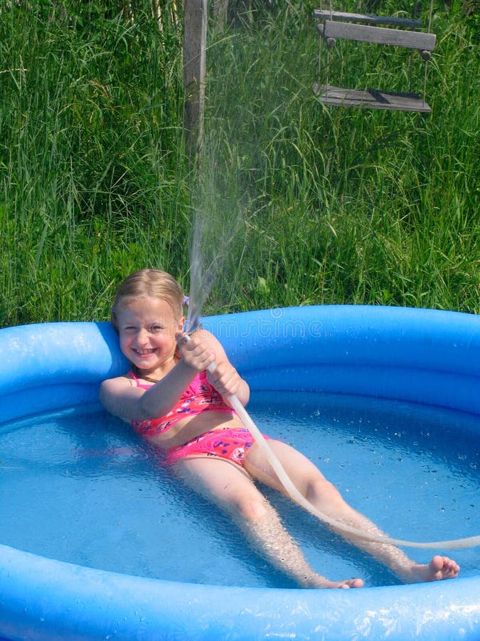 Girl playing with the watter