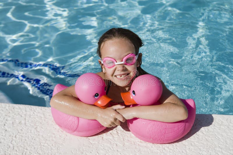 Girl At Poolside royalty free stock photo