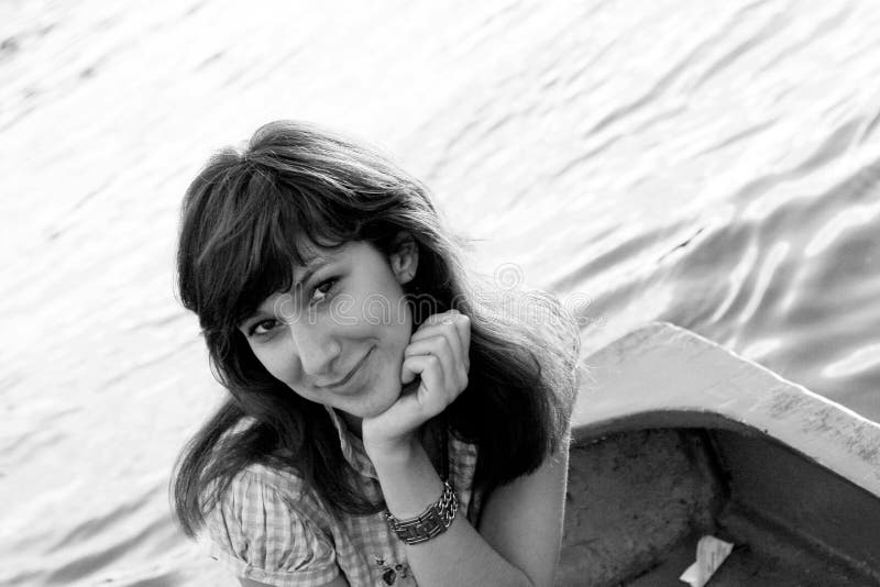 Girl posing on a boat