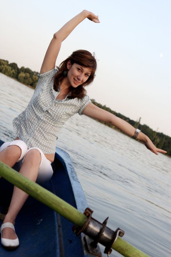 Girl posing on a boat