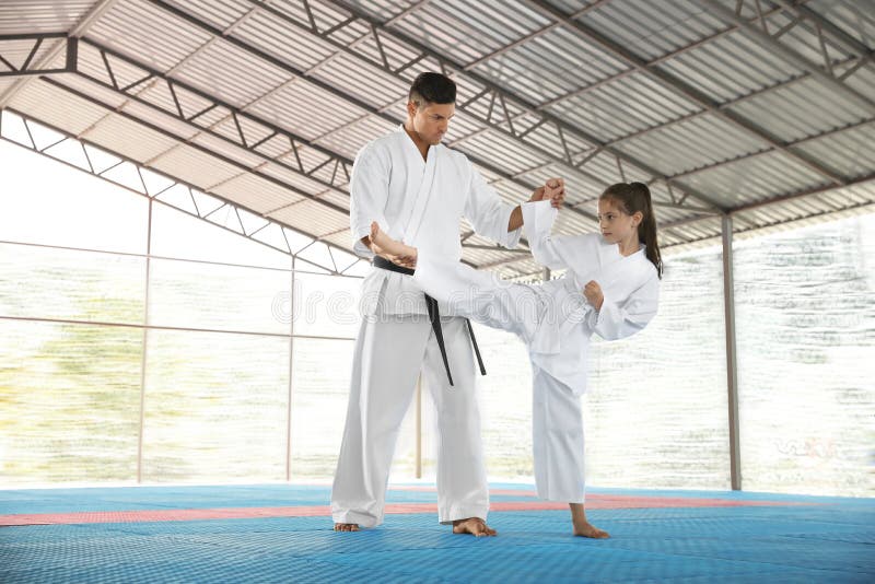 Girl Practicing Karate With Coach On Tatami Outdoors Stock Image Image Of Activity Instructor